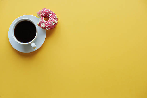 Coffee break time with donuts Coffee break time with donuts coffee break stock pictures, royalty-free photos & images