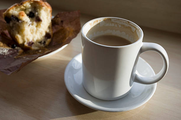 coffee cup and muffin stock photo