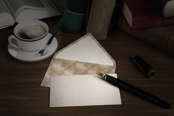 Coffee, fountain pen with ticket, blank letter and space to write. stock photo