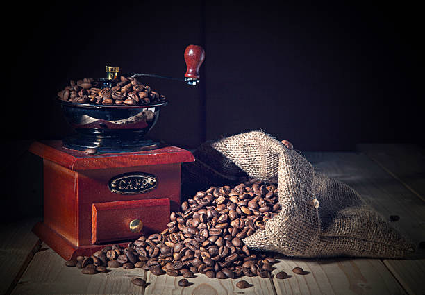 Coffee Grinder and beans with sack stock photo