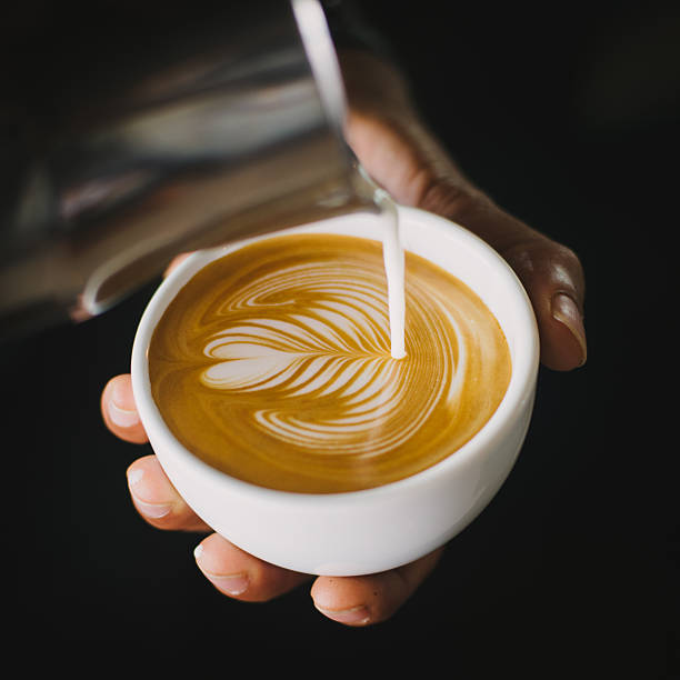 coffee latte art in coffee shop stock photo