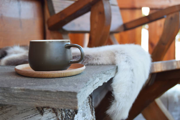 Coffee outside by reindeer skins in Norway stock photo