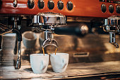 istock Coffee preparation with espresso machine 1291679068