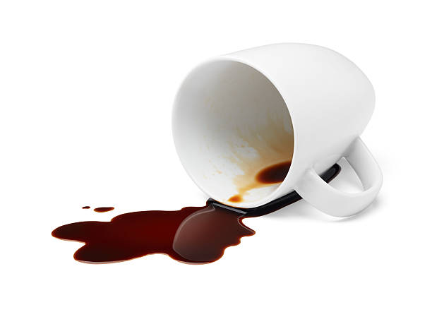 coffee spilling cup of black coffee spilling causing stained spilling stock pictures, royalty-free photos & images