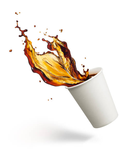 coffee splash cup of coffee splashing against white background spilling stock pictures, royalty-free photos & images