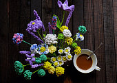 istock coffee table with handmade flower by crochet, coffee cup, amazing artwork 1404979906