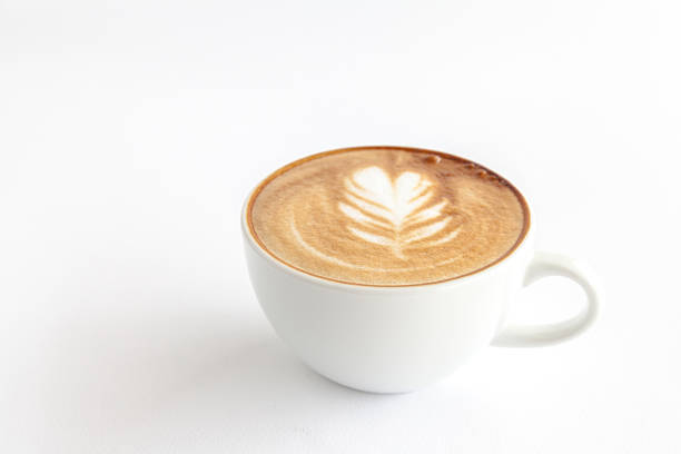 coffee with latte art on white background stock photo