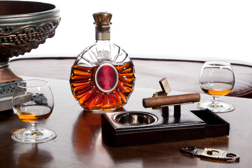 Two glass of cognac and cigar