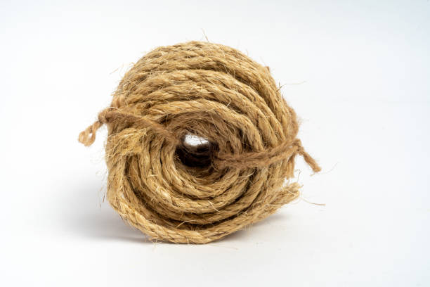 Coil of fiber rope sisal small on isolated white background stock photo