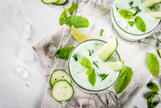 Cold cucumber and avocado soup stock photo