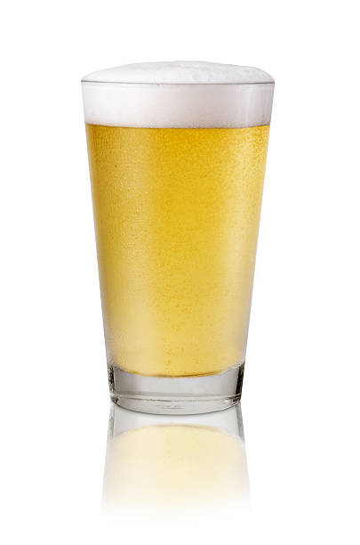 Cold Draught Beer A refreshing pint of cold beer on a white background. Image has clipping path. pint glass stock pictures, royalty-free photos & images