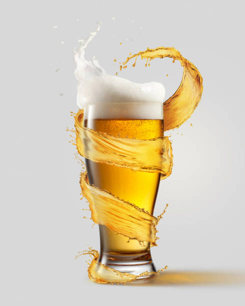 A cold glass of beer and a splash stock photo