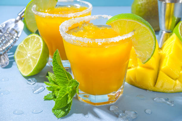 Cold mango margaritas stock photo