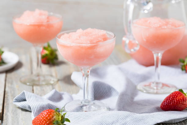 Cold Refreshing Frozen Rosé Wine Cocktail Cold Refreshing Frozen Frosé Rosé Wine Cocktail in the Summer rose wine stock pictures, royalty-free photos & images