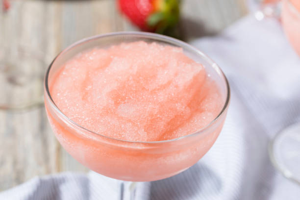 Cold Refreshing Frozen Rosé Wine Cocktail Cold Refreshing Frozen Frosé Rosé Wine Cocktail in the Summer frozen rose stock pictures, royalty-free photos & images