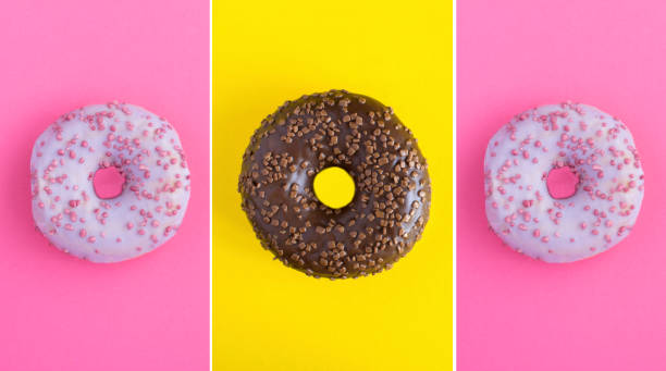 Collage of donut. Donut with purple and chocolate glaze on the colored background. Close-up. stock photo