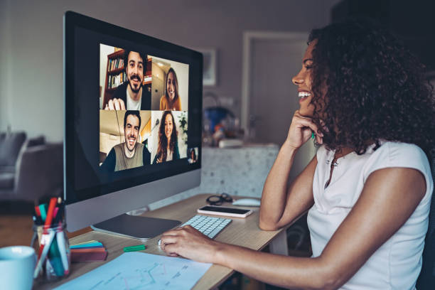 Colleagues talk online from their homes Group of people having a video conference zoom meeting stock pictures, royalty-free photos & images