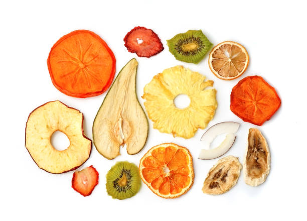 Collection of dried fruits Collection of dried fruits isolated on white backgrounds. dried fruit stock pictures, royalty-free photos & images
