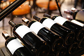 istock Collection of wine bottles in store 1130220889
