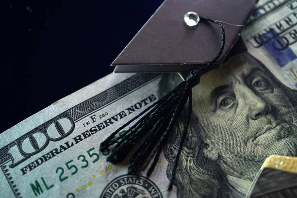College and money shot of money and college theme scholarships stock pictures, royalty-free photos & images