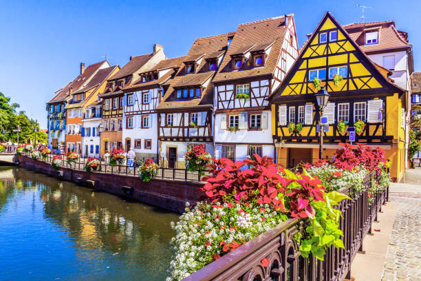 Colmar, France. Colmar, Alsace, France. Petit Venice, water canal and traditional half timbered houses. strasbourg stock pictures, royalty-free photos & images