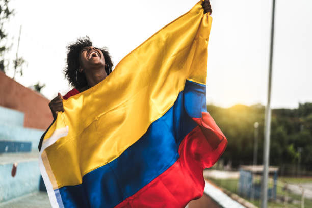 Colombian fan watching a soccer game Happy Brazilian fan colombian ethnicity stock pictures, royalty-free photos & images
