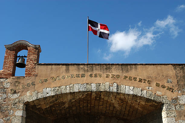 colonial building and national flag at Santo Domingo stock photo
