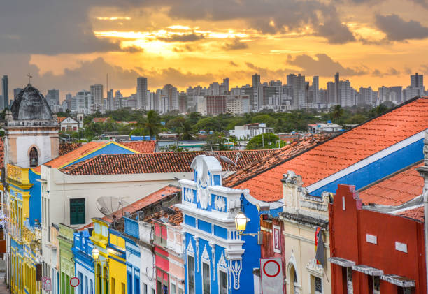Colonial buildings and cobblestone streets at sunset, Olinda in Pernambuco, Brazil The historic architecture of Olinda in Pernambuco, Brazil with its colonial buildings and cobblestone streets at sunset. pernambuco state stock pictures, royalty-free photos & images
