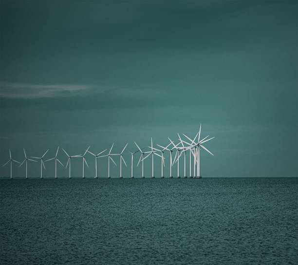 Colony of wind power stations in Baltic sea, Denmark stock photo