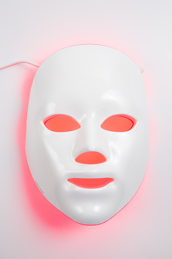 Color therapy mask glowing on the white background.