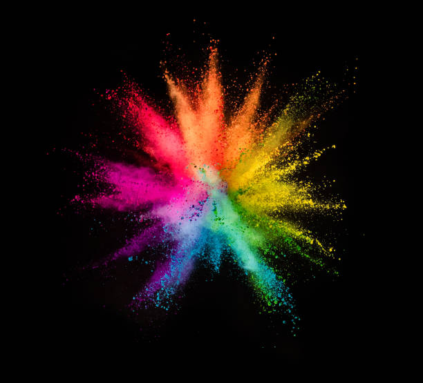 colored powder explosion on black background - misturar imagens e fotografias de stock
