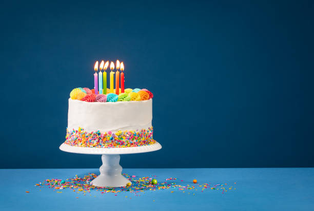 Colorful Birthday Cake over Blue stock photo