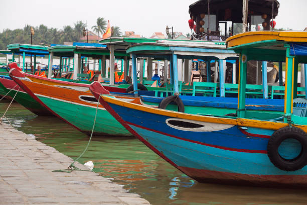 Colorful boats in Hoi An, Vietnam stock photo