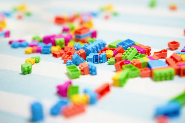 colorful bricks toy on mat floor for playing stock photo