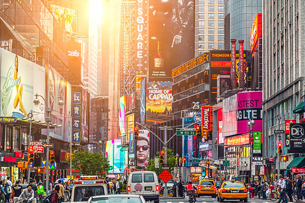 Colorful building signs and cars in Times Square stock photo