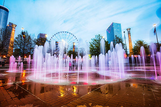 Colorful Centennial Fountain at night stock photo