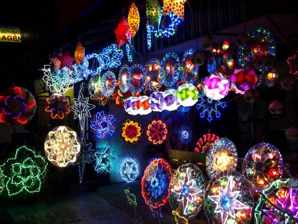 Colorful Christmas lanterns on display at a store stock photo