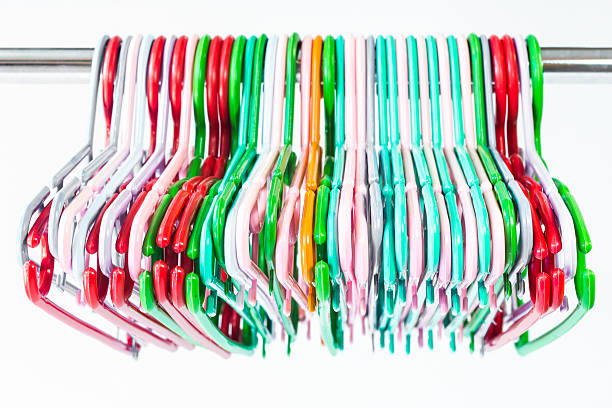 Colorful clothes hangers isolated on white stock photo