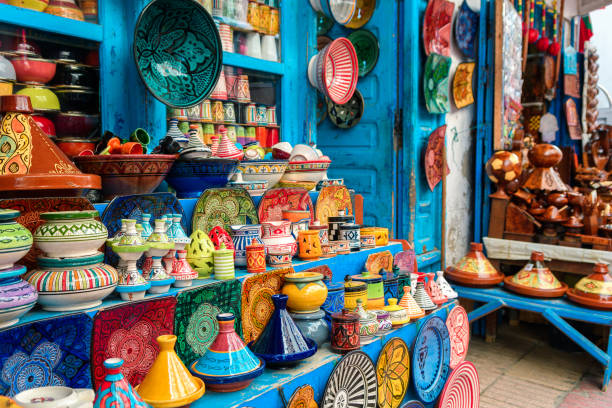 colorful crockery at moroccan shop colorful plates at moroccan shop morocco stock pictures, royalty-free photos & images