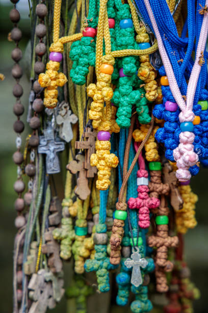 colorful crosses made of thread on the Holy Mountain of Grabarka in Poland stock photo