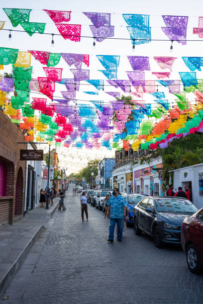 Colorful flags decorate n Alvaro Obregon street  in San Jose del Cabo, Baja Sur,  Mexico stock photo