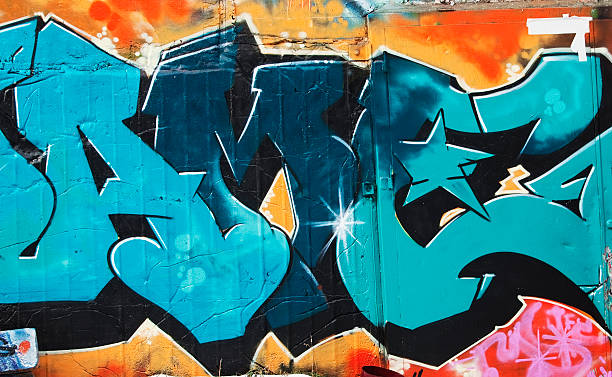 colorful graffiti on a concrete wall. - 都市生活 插圖 個照片及圖片檔
