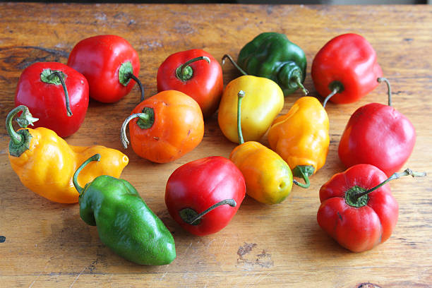 Colorful Hot Peppers on a Table stock photo