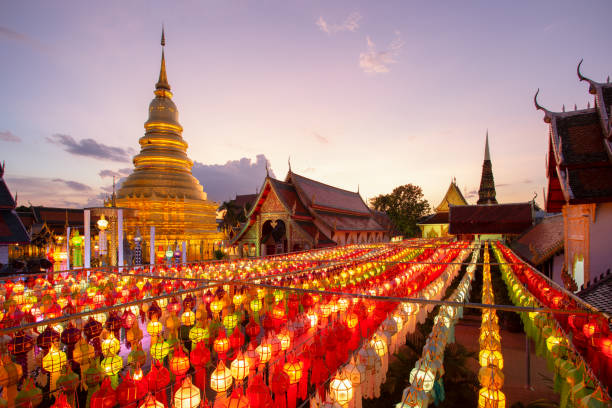 Colorful Lamp Festival and Lantern in Loi Krathong at Wat Phra That Hariphunchai, Lamphun Province, Thailand stock photo