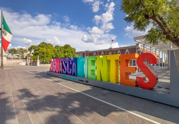 Colorful letters of Aguascalientes central square Plaza de la Patria in front of Aguascalientes Cathedral stock photo
