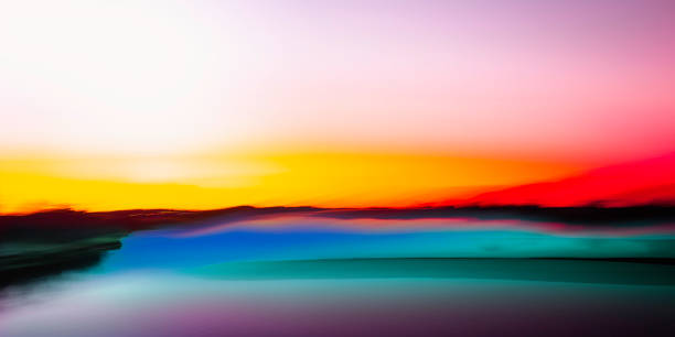 Colorful ocean, island, and sky background image with space for texts and design. Sunrise and sunset seascape of motion blur photography. stock photo