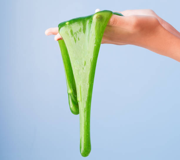 Colorful of Homemade Toy Called Slime, Kids having fun and being creative by science experiment. stock photo