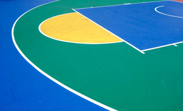 colorful outdoor rubber basketball playground detail aerial view colorful outdoor rubber basketball playground aerial view courtyard stock pictures, royalty-free photos & images