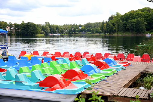 Colorful pedal boats on Galvé Lake, Trakai Castle, Vilnius, Lithuania