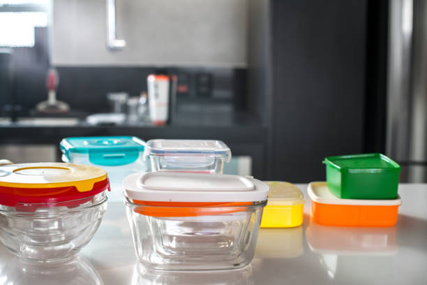 colorful plastic pots on top of kitchen counter colorful plastic pots on top of kitchen counter plastic container stock pictures, royalty-free photos & images